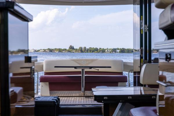 Slide: The Image of Interior view of 2009 Marquis 500 Sport Coupe yacht with scenic water backdrop. - 30