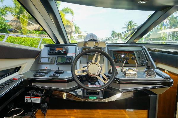 Slide: The Image of 2009 Marquis 500 Sport Coupe yacht helm with advanced navigation controls. - 34