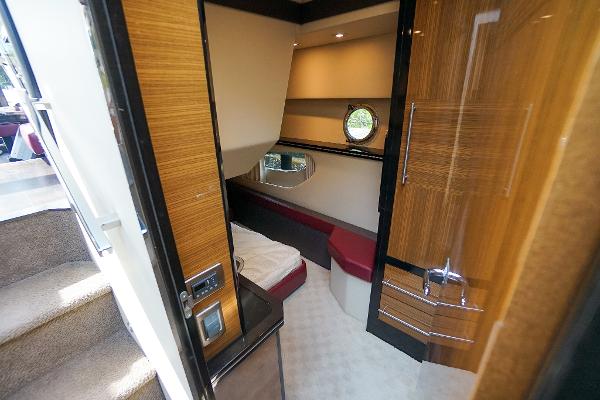 Slide: The Image of Interior cabin of 2009 Marquis 500 Sport Coupe yacht with modern wood finishes. - 41