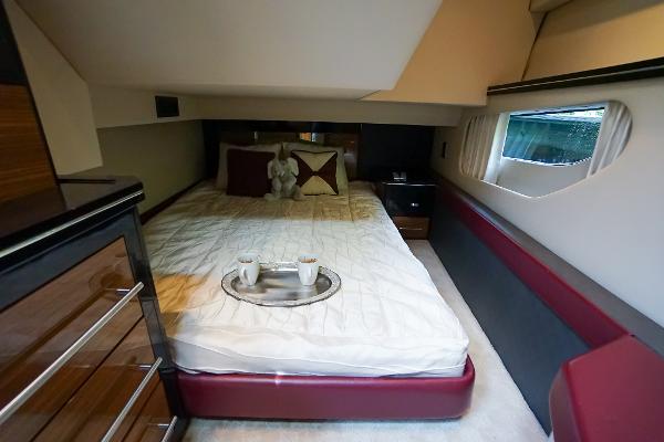 Slide: The Image of Luxurious bedroom in 2009 Marquis 500 Sport Coupe yacht with cozy bed and modern decor. - 42