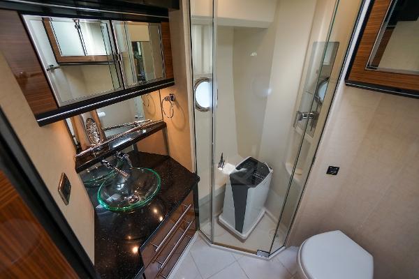 Slide: The Image of Luxurious bathroom in 2009 Marquis 500 Sport Coupe yacht with glass sink and shower. - 46