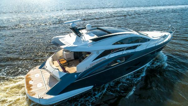 Slide: The Image of 2009 Marquis 500 Sport Coupe luxury yacht cruising on open water. - 5