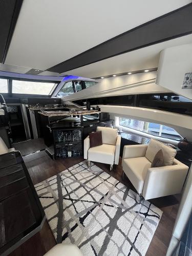 Slide: The Image of Luxurious interior of a 2017 Marquis 500 Sport Yacht with modern furnishings. - 30