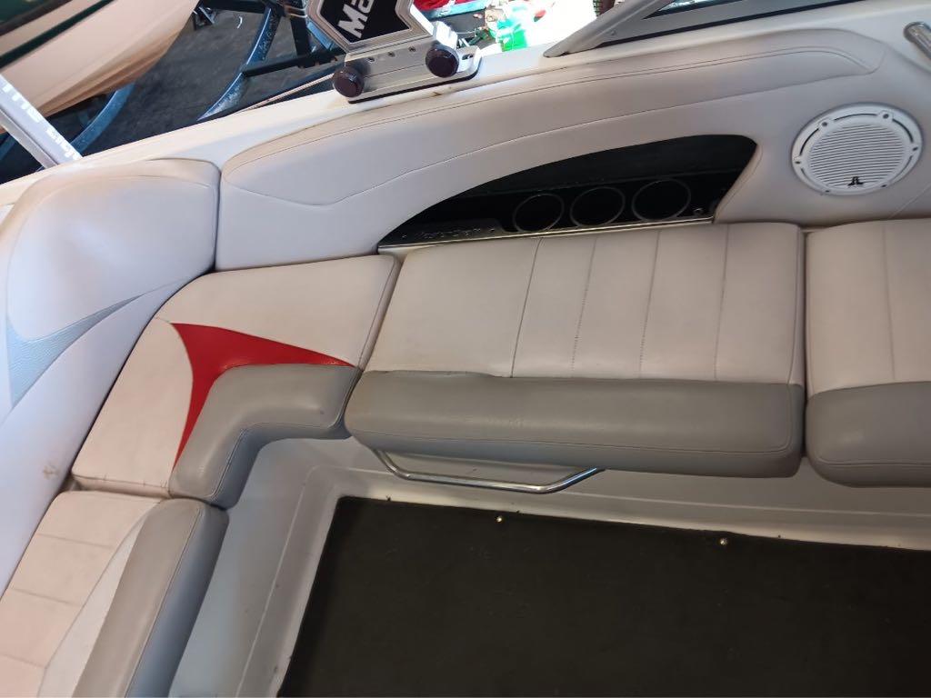 Slide: The Image of Interior seating of a 2007 MasterCraft X15 boat with white and gray upholstery. - 10