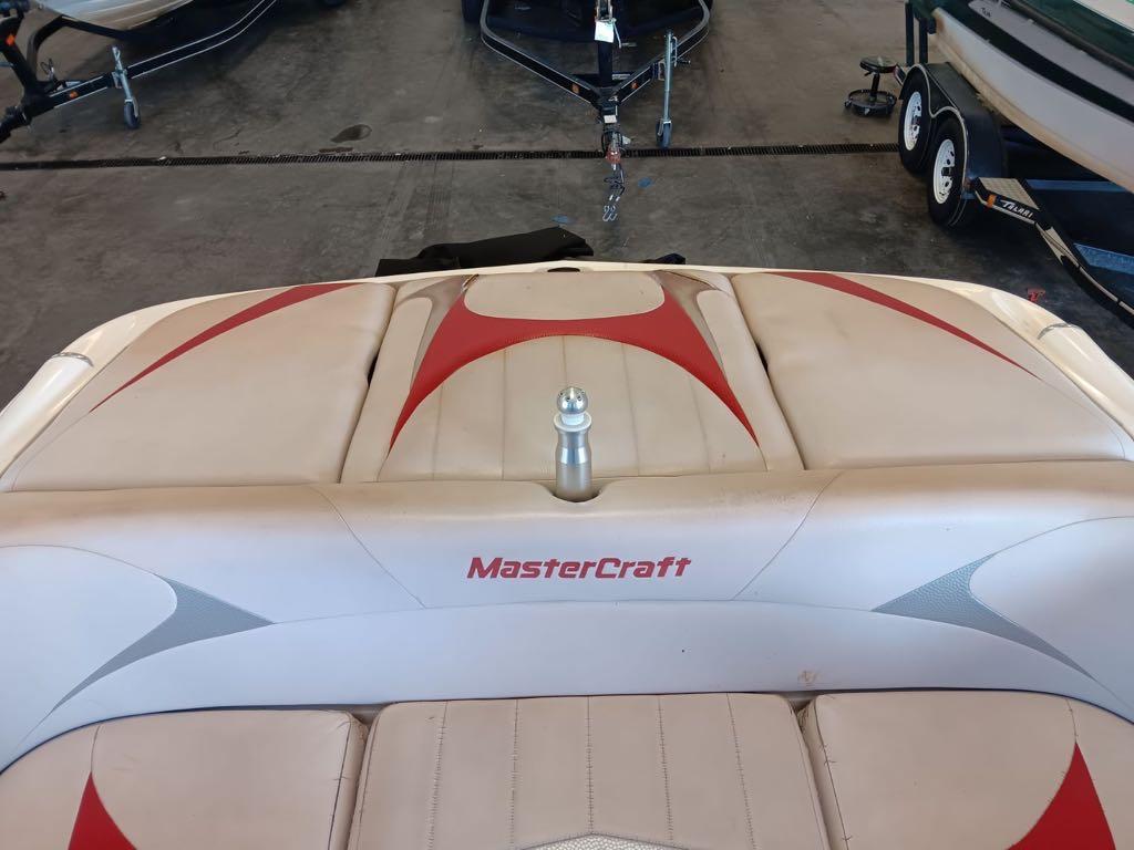 Slide: The Image of 2007 MasterCraft X15 boat interior with red and white upholstery. - 8