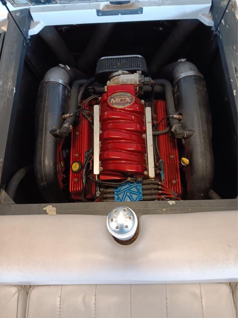 Slide: The Image of 2007 MasterCraft X15 boat engine compartment with red MCX engine. - 9