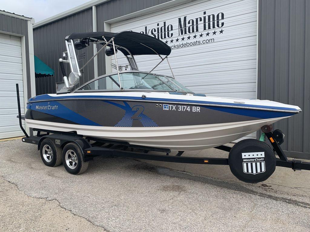 Slide: The Image of 2012 MasterCraft X2 boat on trailer at Dockside Marine. - 1