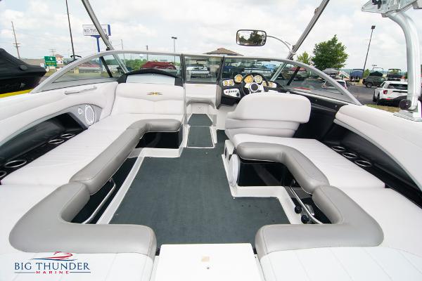 Slide: The Image of 2005 MasterCraft X45 boat interior with spacious seating and modern dashboard. - 15
