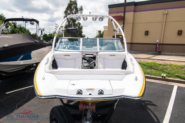 Slide: The Image of 2005 MasterCraft X45 boat on trailer, front view, white and yellow trim. - 3