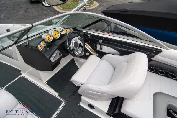 Slide: The Image of 2005 MasterCraft X45 boat interior with steering wheel and dashboard. - 35