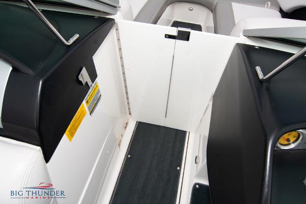 Slide: The Image of 2005 MasterCraft X45 boat interior with open walkway and seating. - 42