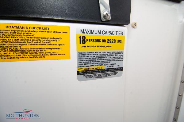 Slide: The Image of 2005 MasterCraft X45 boat capacity label, 18 persons or 2928 lbs, safety checklist. - 43