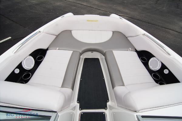 Slide: The Image of 2005 MasterCraft X45 boat interior with white and gray seating. - 44