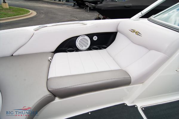 Slide: The Image of 2005 MasterCraft X45 boat interior seating with speaker and cup holders. - 45