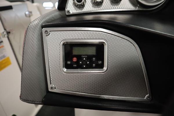 Slide: The Image of 2013 MasterCraft X55 boat dashboard with Clarion audio system. - 37