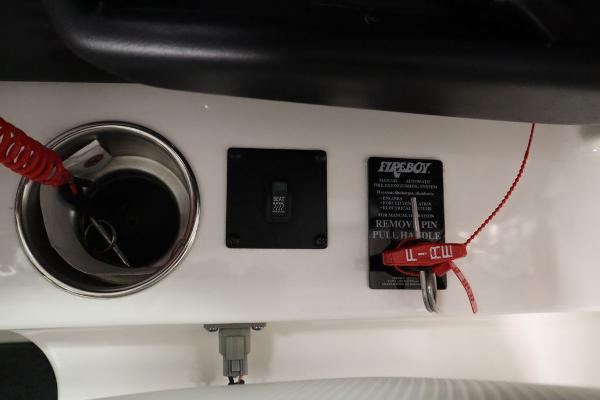 Slide: The Image of MasterCraft X55 2013 boat control panel with ignition key and safety lanyard. - 39