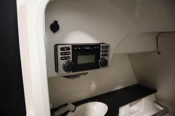 Slide: The Image of 2013 MasterCraft X55 boat interior with control panel and sink. - 49