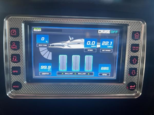 Slide: The Image of 2013 MasterCraft XStar dashboard display showing speed, depth, ballast, and RPM. - 18