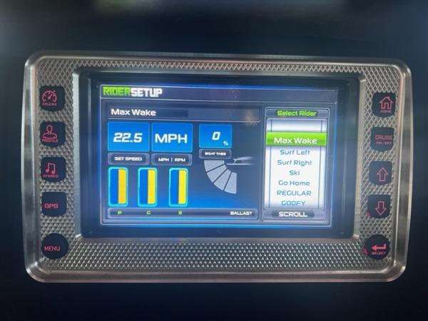 Slide: The Image of MasterCraft XStar 2013 boat touchscreen display showing rider setup and speed settings. - 19