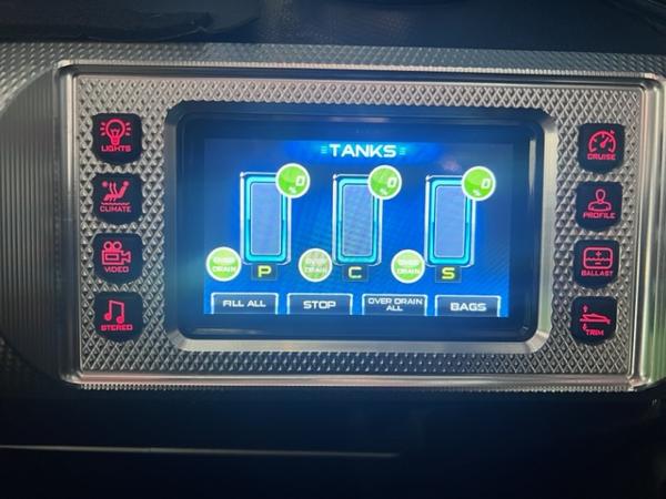 Slide: The Image of MasterCraft XStar 2013 touchscreen control panel for ballast tanks and boat functions. - 28