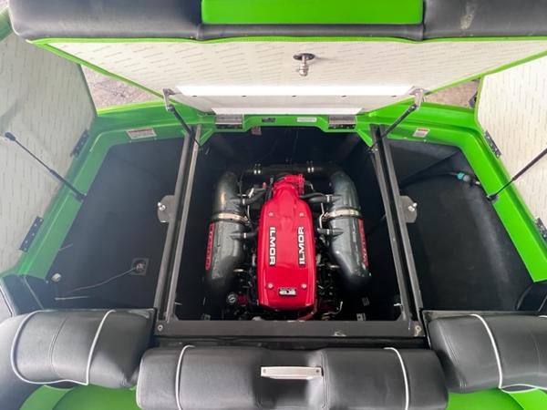 Slide: The Image of 2013 MasterCraft XStar boat engine compartment with Ilmor engine. - 39