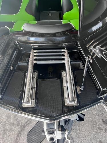 Slide: The Image of 2013 MasterCraft XStar boat with open engine compartment. - 6