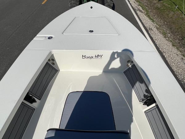 Slide: The Image of 2024 Maverick 18 HPX-V boat interior with seating and storage compartments. - 12
