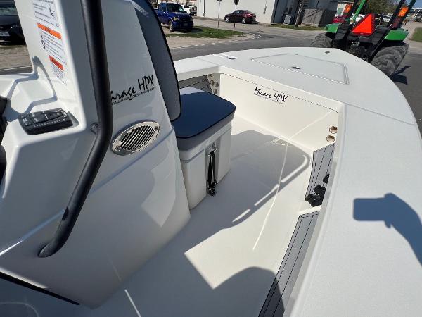Slide: The Image of 2024 Maverick 18 HPX-V boat interior with seating and storage. - 13