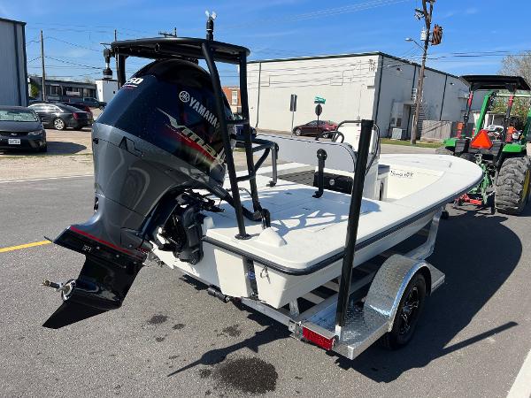 Slide: The Image of 2024 Maverick 18 HPX-V boat with Yamaha outboard motor on trailer. - 4