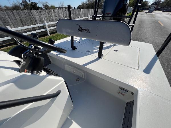 Slide: The Image of 2024 Maverick 18 HPX-V boat interior with steering wheel and seating. - 9