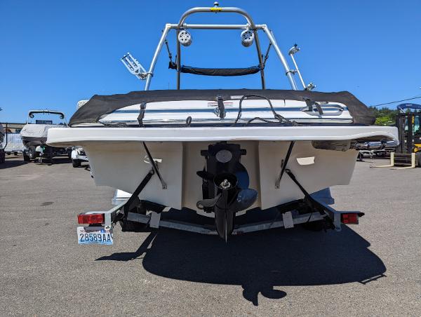 Slide: The Image of 2007 Maxum 1800 SR3 boat, rear view, parked on trailer in sunny lot. - 4