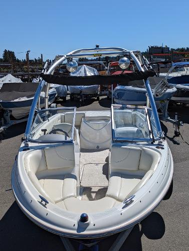 Slide: The Image of 2007 Maxum 1800 SR3 boat with open bow seating, docked outdoors. - 6