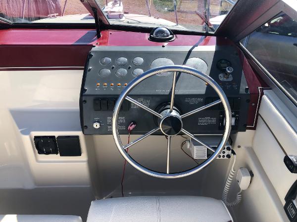 Slide: The Image of Steering wheel and dashboard of 1992 Maxum 2300 SCR boat. - 1