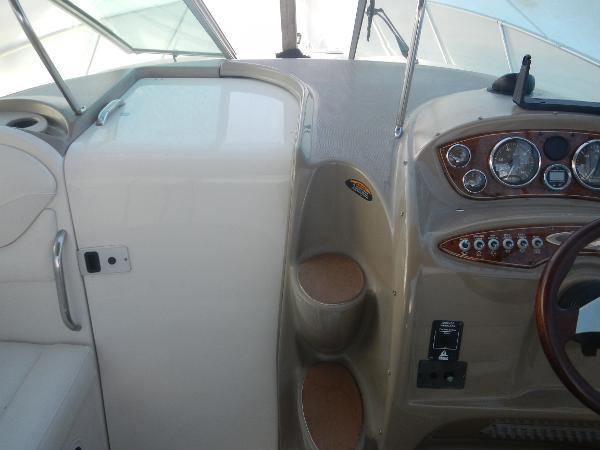 Slide: The Image of 2001 Maxum 2500 SCR boat dashboard and cockpit area. - 15