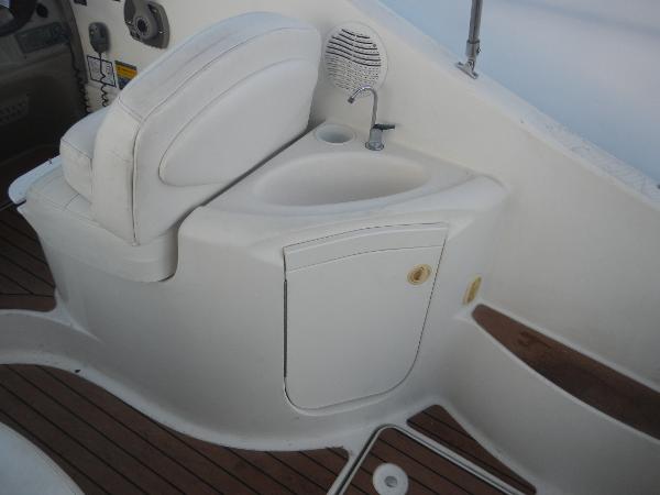 Slide: The Image of 2001 Maxum 2500 SCR boat interior with sink and seating. - 17