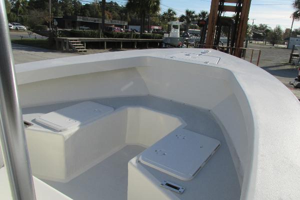 Slide: The Image of 2023 May-Craft 20 Cape Classic boat interior with seating and storage compartments. - 10