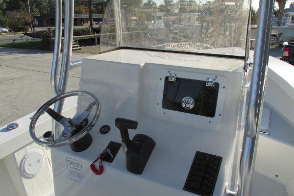 Slide: The Image of 2023 May-Craft 20 Cape Classic boat console with steering wheel and controls. - 11