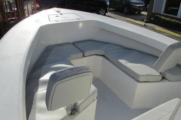 Slide: The Image of 2023 May-Craft 20 Cape Classic boat interior with cushioned seating. - 14