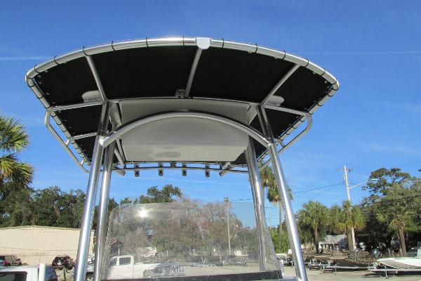 Slide: The Image of 2023 May-Craft 20 Cape Classic boat with T-top against blue sky. - 17