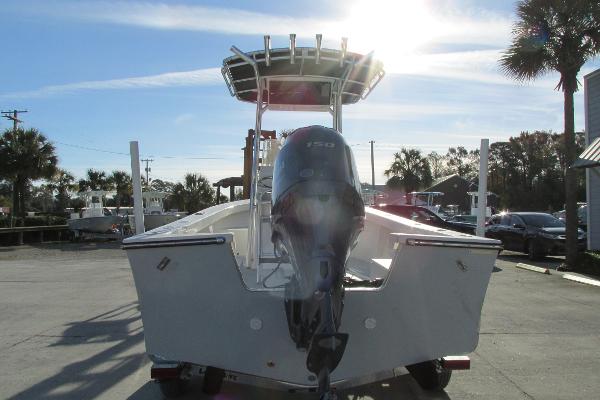 Slide: The Image of 2023 May-Craft 20 Cape Classic boat with outboard motor in sunny marina. - 4