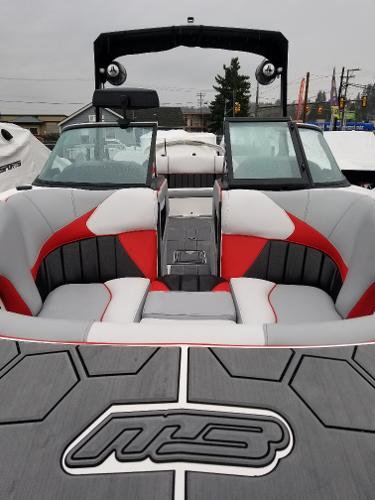 Slide: The Image of 2022 MB B52-23 boat with red and gray interior, open bow seating. - 22