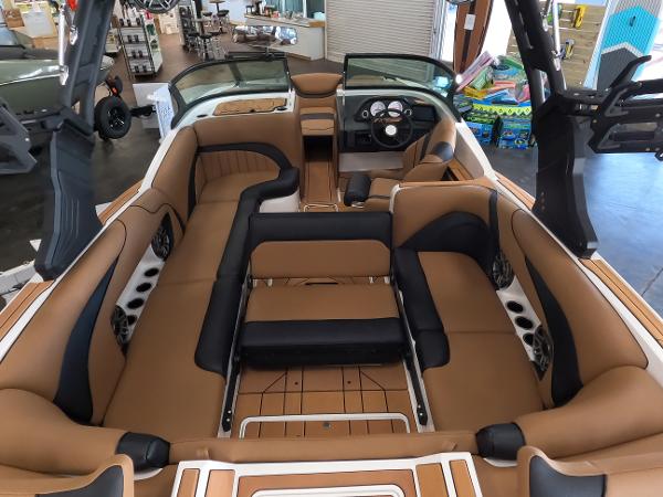 Slide: The Image of 2023 MB B52 Alpha boat interior with tan and black seating. - 10