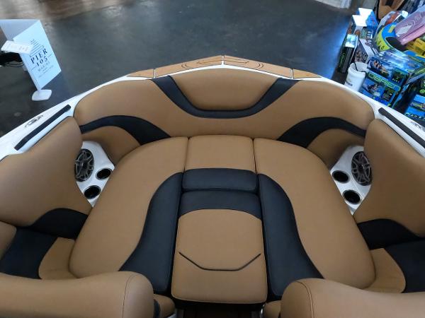 Slide: The Image of 2023 MB B52 Alpha boat with tan and black cushioned seating. - 18