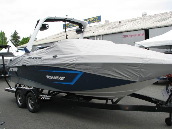 Slide: The Image of 2022 MB F22 Tomcat boat with cover on trailer in parking lot. - 5