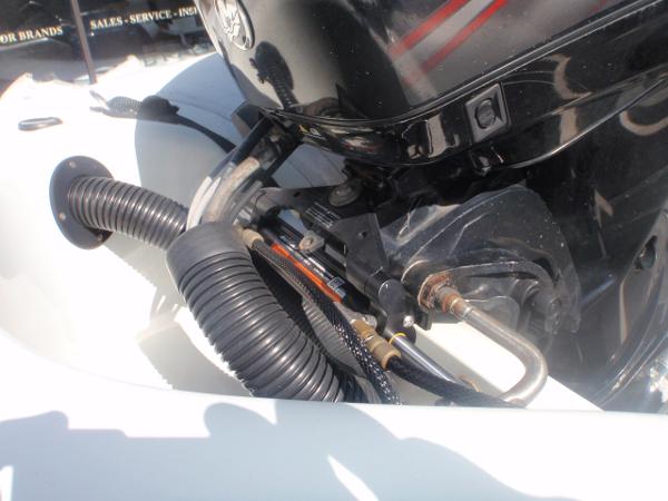 Slide: The Image of Close-up of a 2014 Mercury Amanzi 350 boat engine. - 2