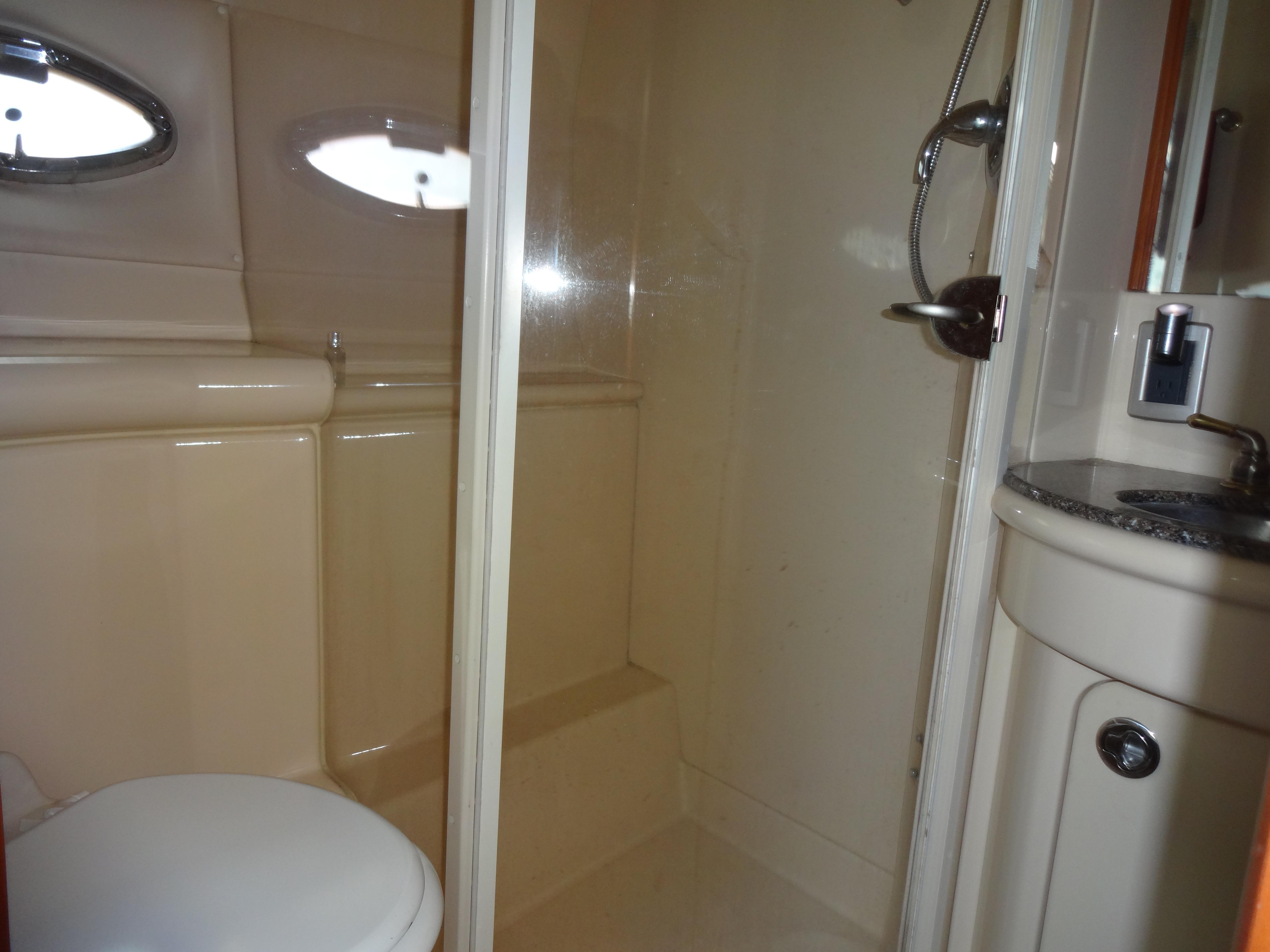 Slide: The Image of Bathroom of 2004 Meridian 408 Motoryacht with shower, toilet, and sink. - 45