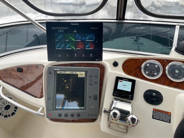 Slide: The Image of Helm of 2004 Meridian 459 Motoryacht with navigation and control systems. - 11