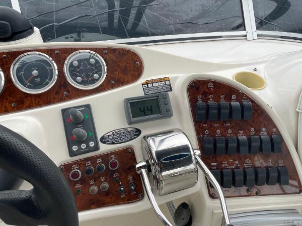 Slide: The Image of Control panel of a 2004 Meridian 459 Motoryacht with gauges and switches. - 14