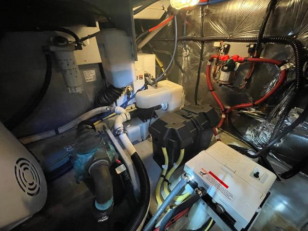 Slide: The Image of Engine room of 2004 Meridian 459 Motoryacht with visible wiring and components. - 45