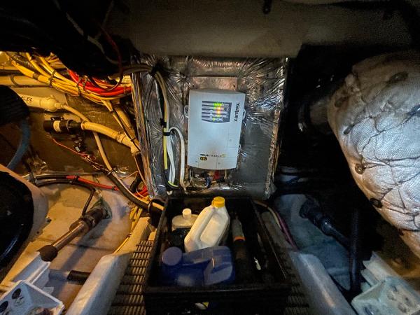 Slide: The Image of Engine room of 2004 Meridian 459 Motoryacht with electrical panel and maintenance supplies. - 48